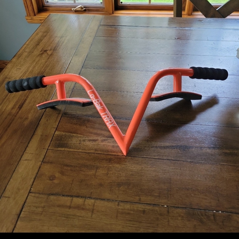 Lo Bak Trax Portable Spinal Traction Device by Chiropractor LORI GREINER orange